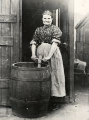 Cramlington, Mrs. Dormand with her washing - Click for bigger image