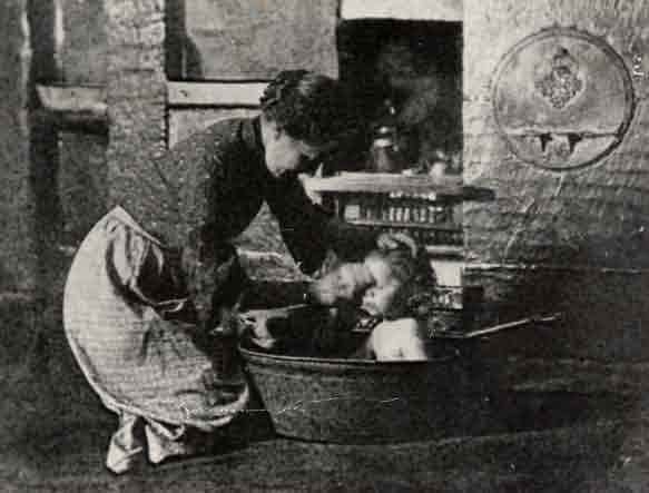 Picture of Cramlington, Mrs. Nellie Robson bathing her daughter Annie
