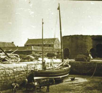 Picture of Beadnell Harbour with fishing boat