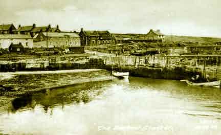 Picture of Craster, Village Houses and Fishing Cobles